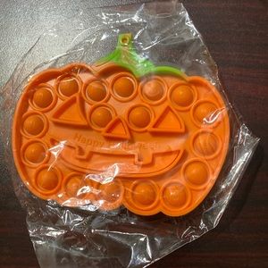 Pumpkin pop it “happy Halloween”
